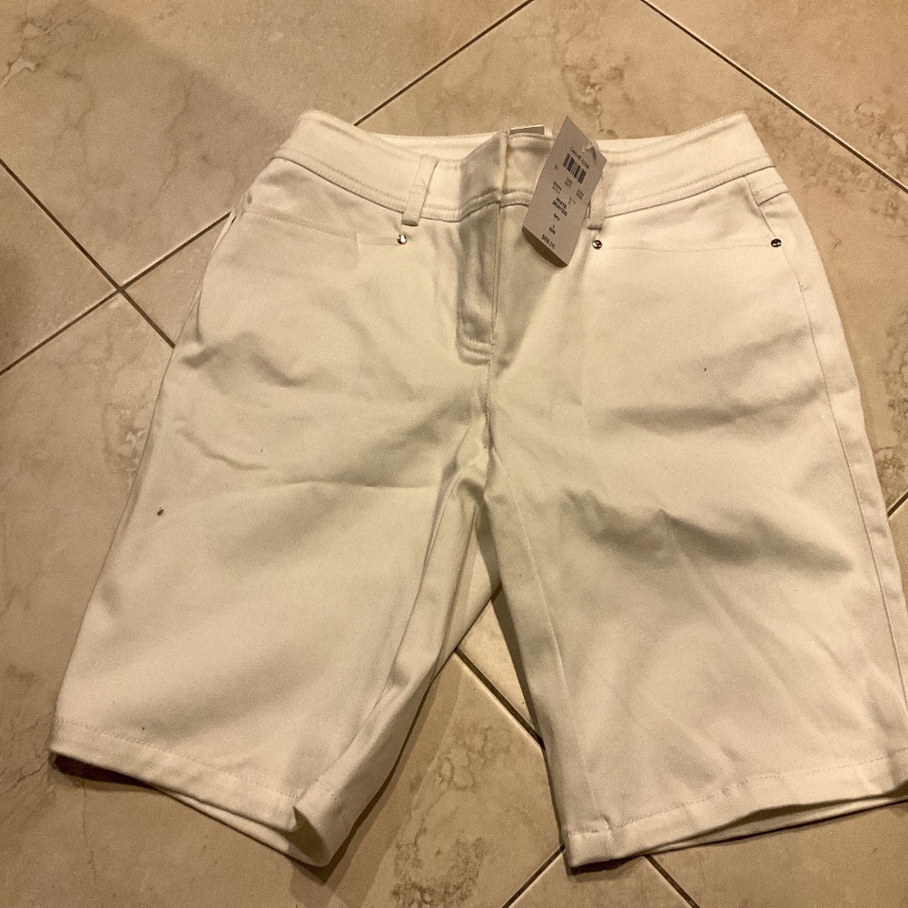 I am selling white jean shorts! In a size 2. The brand is cache.